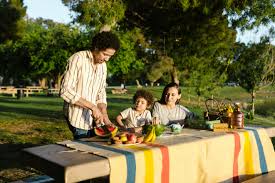 A family having fun next to the water